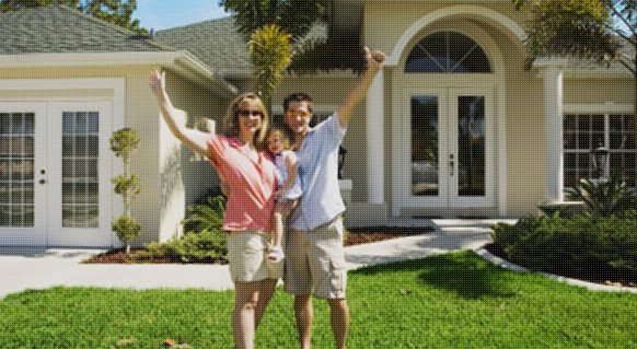 happy family outside the house